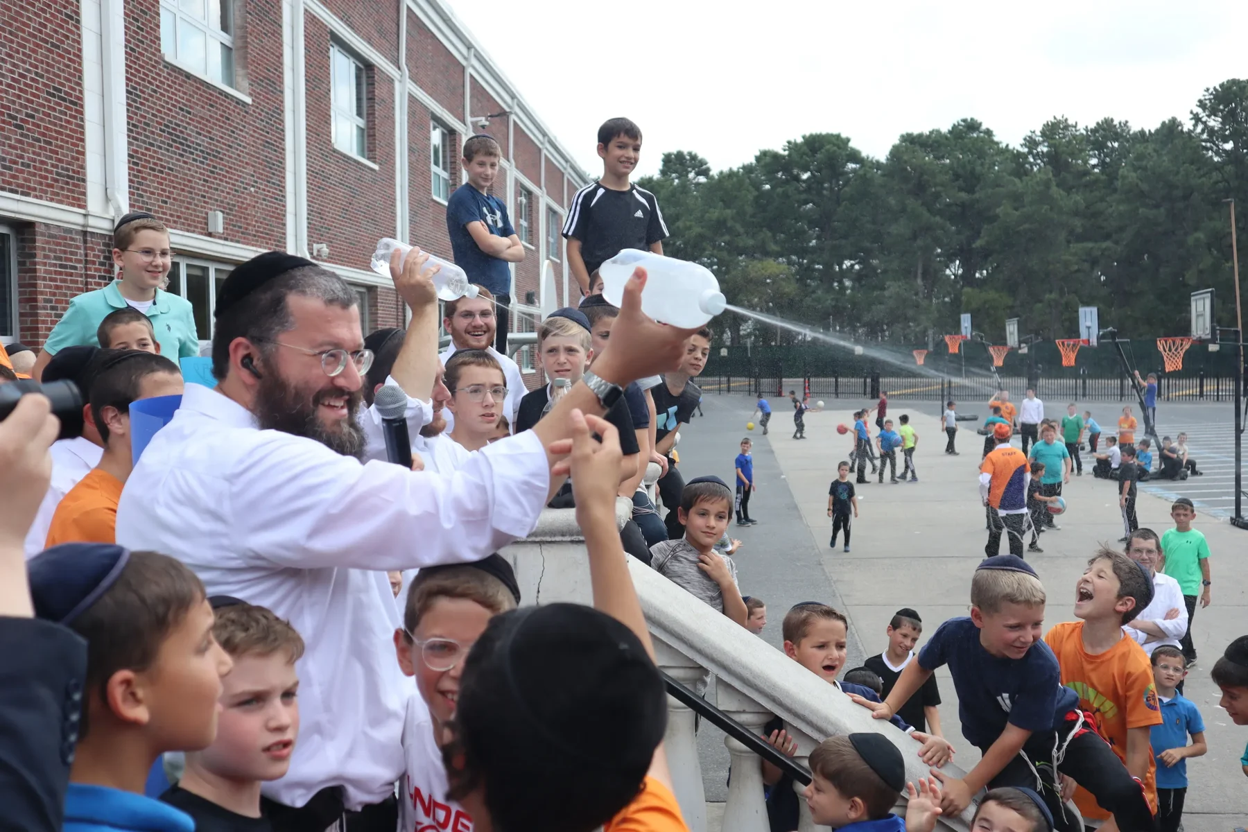 Campers gathering together outdoors at Camp Chevra